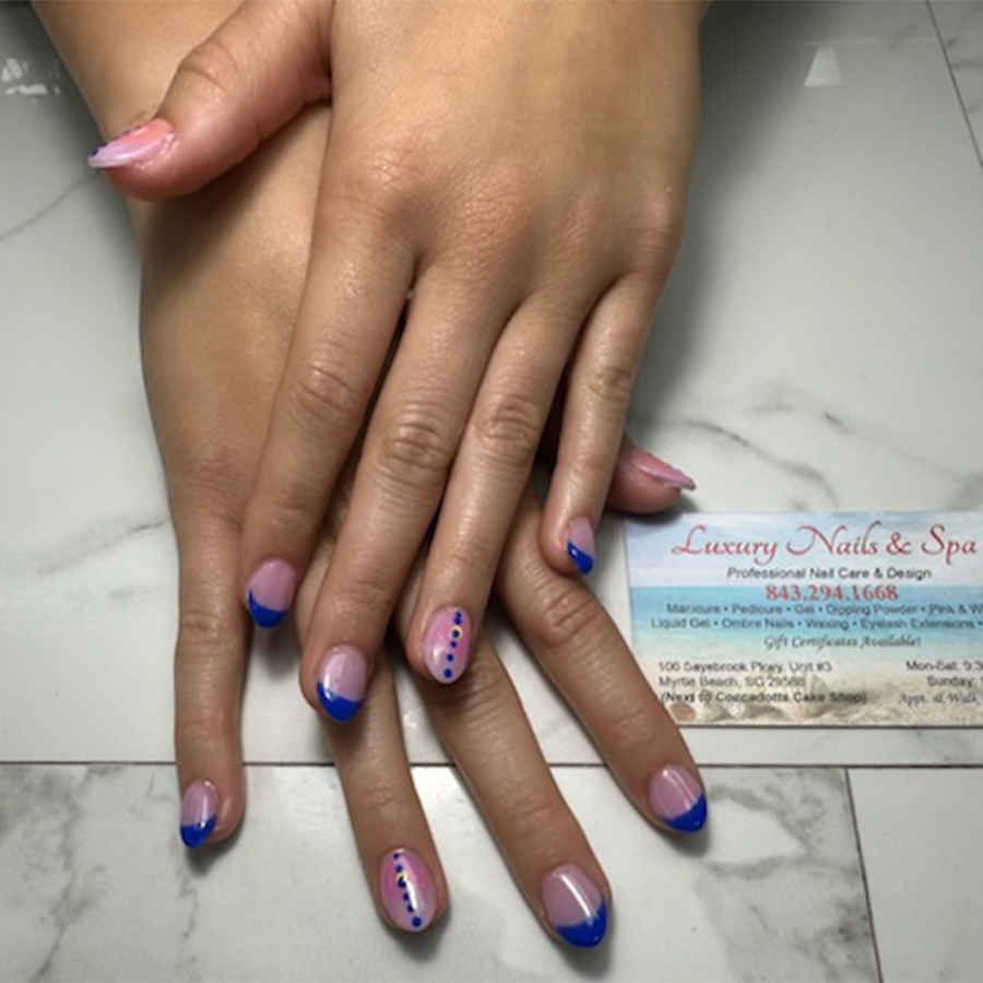 Luxury Nails & Spa logo